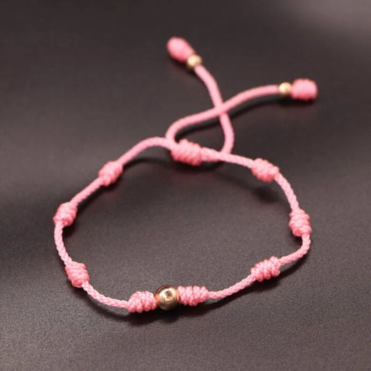 Brazalete nudos balín oro laminado 18k