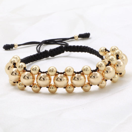 Brazalete Negro con Balin Liso Oro Laminado 18k