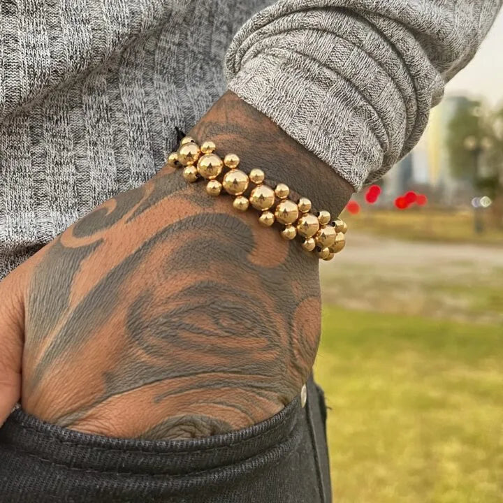 Brazalete Negro con Balin Liso Oro Laminado 18k