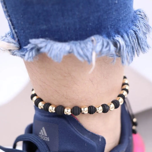 Tobillera Negra Con Neopreno y Balín Oro Laminado 18k