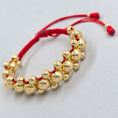 Brazalete Negro con Balin Liso Oro Laminado 18k