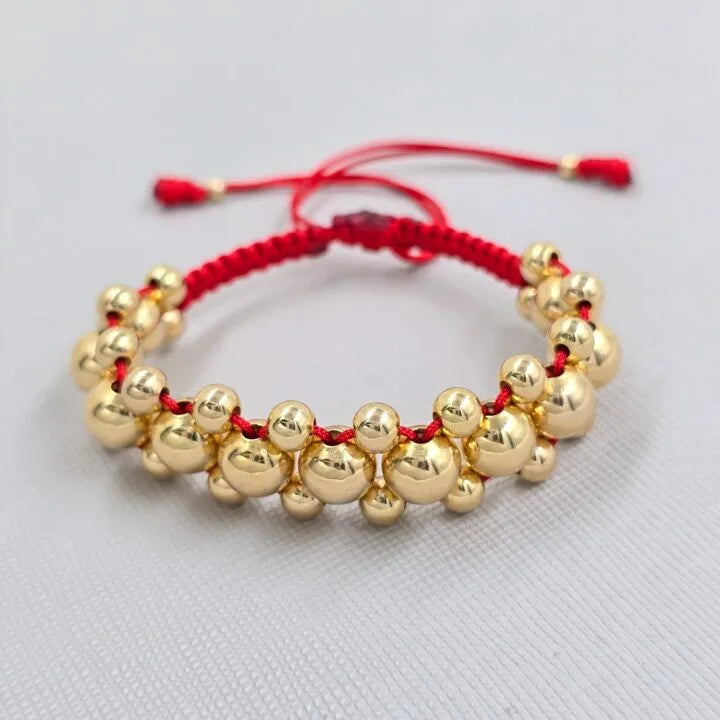 Brazalete Negro con Balin Liso Oro Laminado 18k