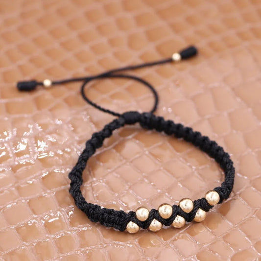 Brazalete Negro Tejido Balín Oro Laminado 18k