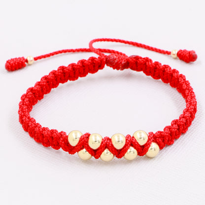 Brazalete Negro Tejido Balín Oro Laminado 18k